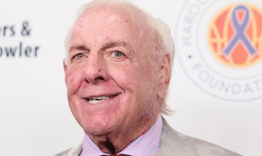Ric Flair, Heisman Trophy kazananı ile yaptığı tartışmanın ardından ESPN yıldızının Michigan hamlesini kesti