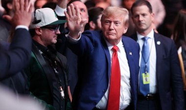 Donald Trump, UFC 296'nın 'en büyük hayran' Colby Covington'ın dövüşü için gelişinde hayranları tarafından alkışlandı ve beşlik çaktı