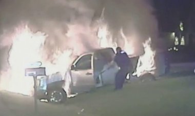 Michigan polis memuru yanan kamyonetin içinde mahsur kalan kadını kurtardı, video gösterileri